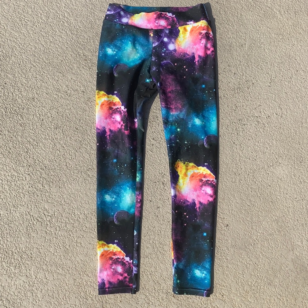 Galaxy Spandex leggings boy or girl size 6. Runs small could fit 5-6 years
